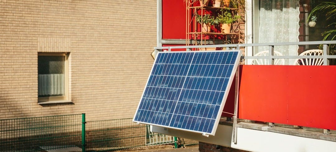 Solar panel on a balcony with plants