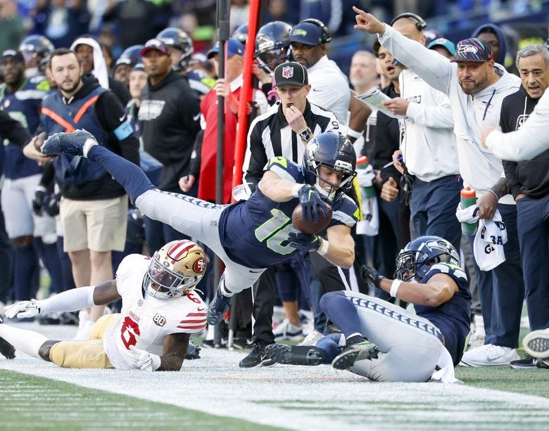 Seattle Seahawks wide receiver Cooper Kupp is ruled just short of a first down on 4th and 10. The San Francisco 49ers played the Seattle Seahawks in NFL Football Sunday, October 11, 2026 at Lumen Field, in Seattle, WA. (Dean Rutz / The Seattle Times)