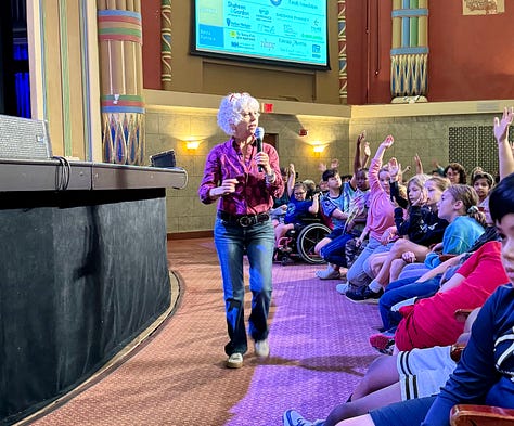 Author Kate DiCamillo talking to kids and answering their questions about her books and her writing.