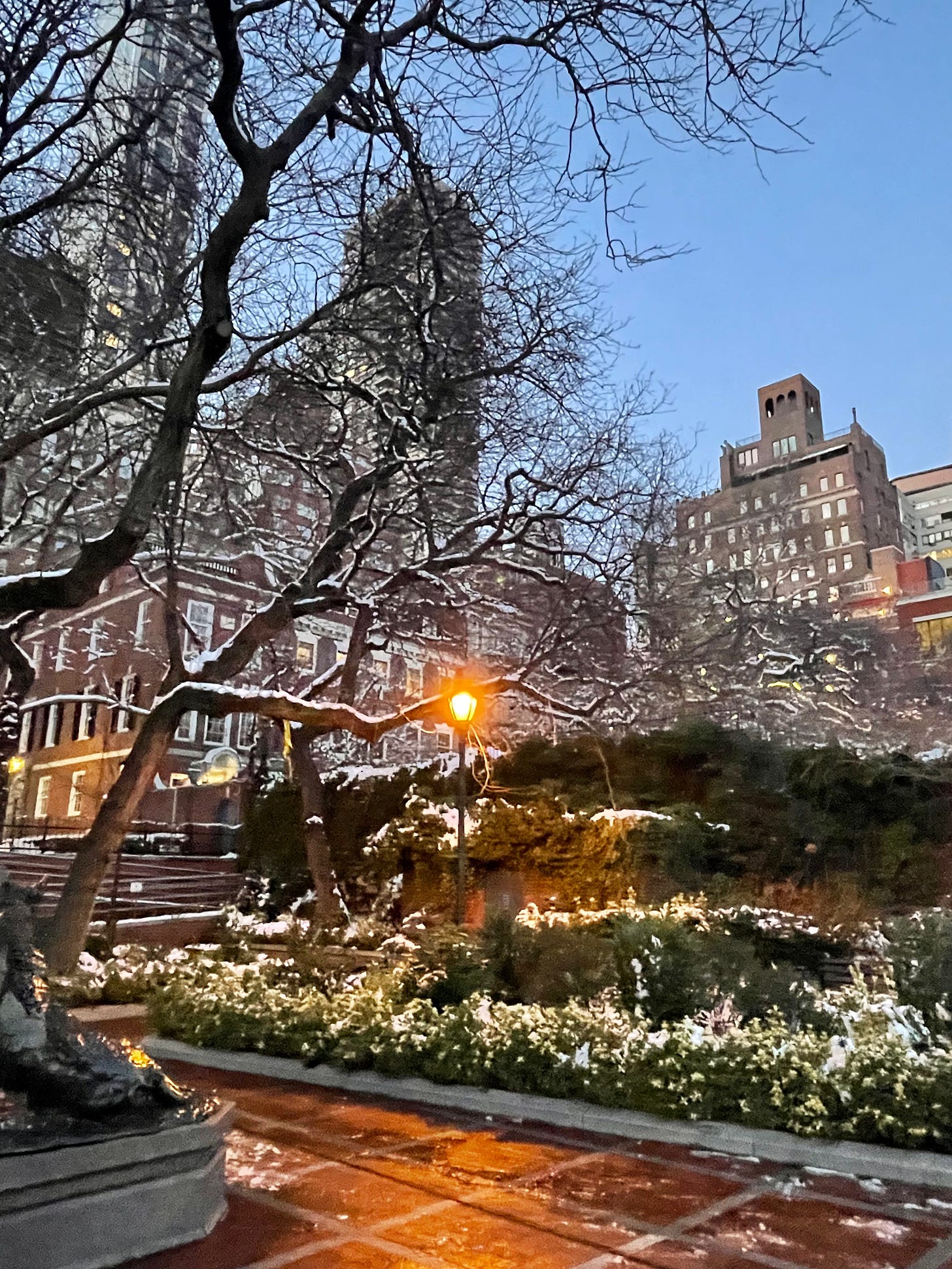 an urban wintery scene, melted snow