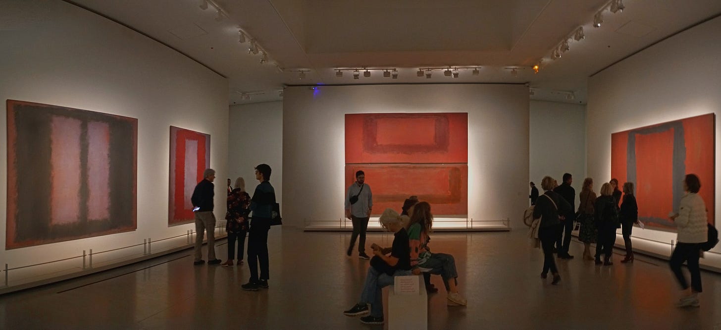Visitors sitting in silence in front of Mark Rothko's Seagram Murals at an exhibition Visitors sitting in silence in front of Mark Rothko's Seagram Murals at an exhibition