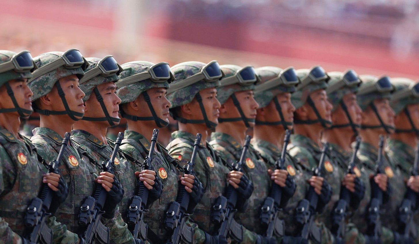 China's Information Support Force personnel march during a military parade to mark the 80th anniversary of the end of World War Two in Beijing, China, September 3, 2025. China's Information Support Force personnel march during a military parade to mark the 80th anniversary of the end of World War Two in Beijing, China, September 3, 2025.