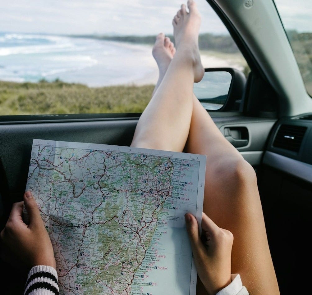 woman holding map woman holding map
