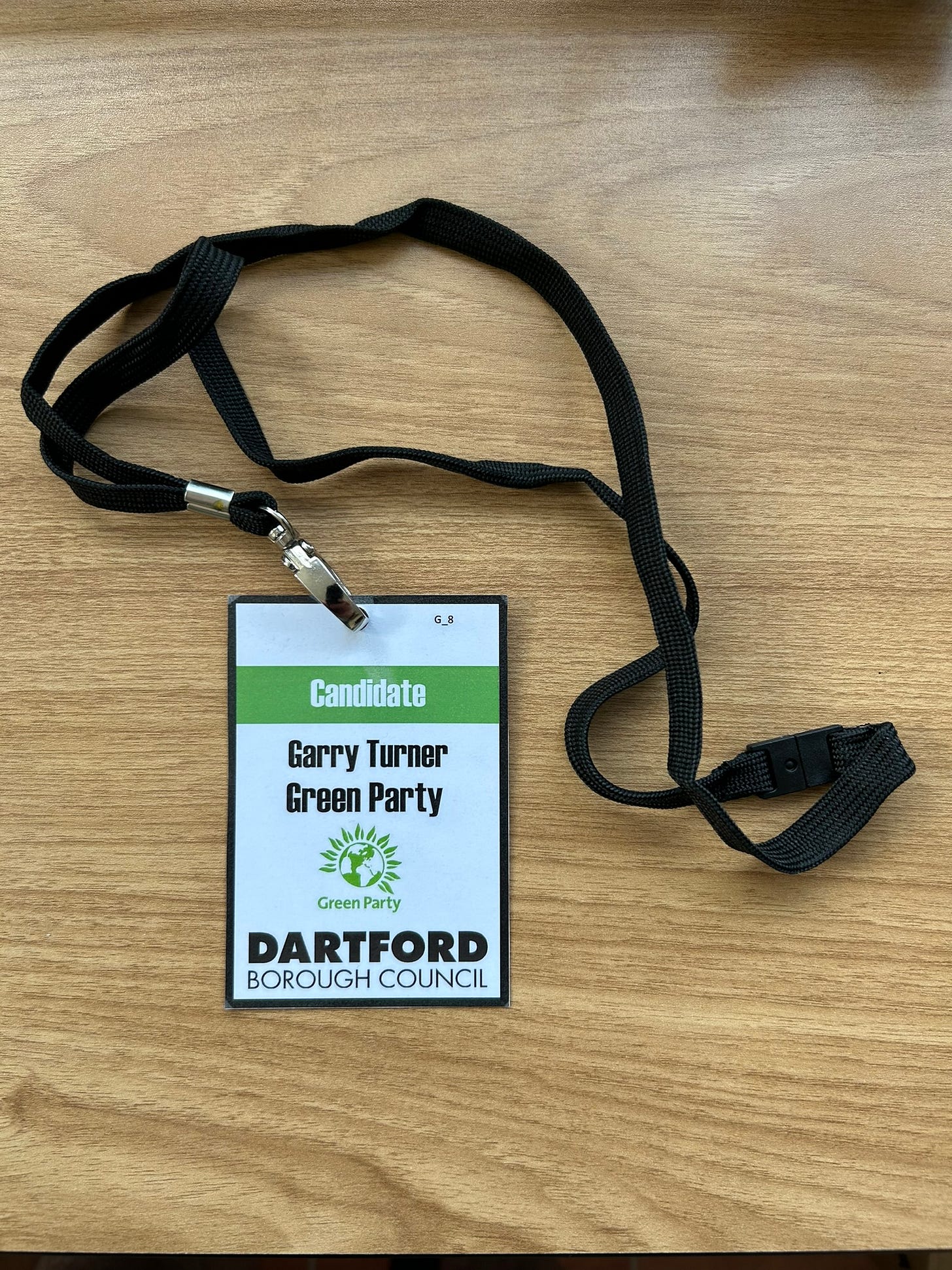 A lanyard that says Candidate. Garry Turner: Green Party.  Dartford Borough Council'