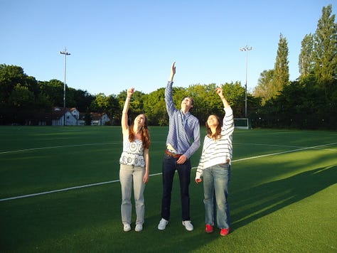 Graduates in front of an old chateau, five year high school reunion, five girls in Brussels