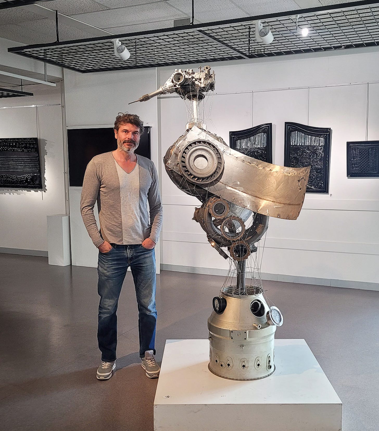 Alan standing with ‘Feathers of Steel