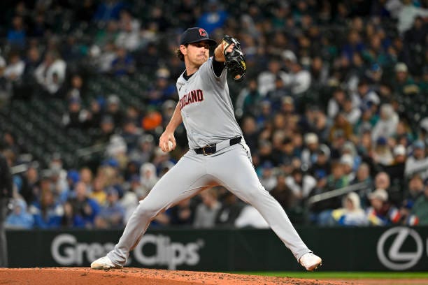 Shane Bieber of the Cleveland Guardians throws a pitch during the fourth inning against the Seattle Mariners at T-Mobile Park on April 02, 2024 in...