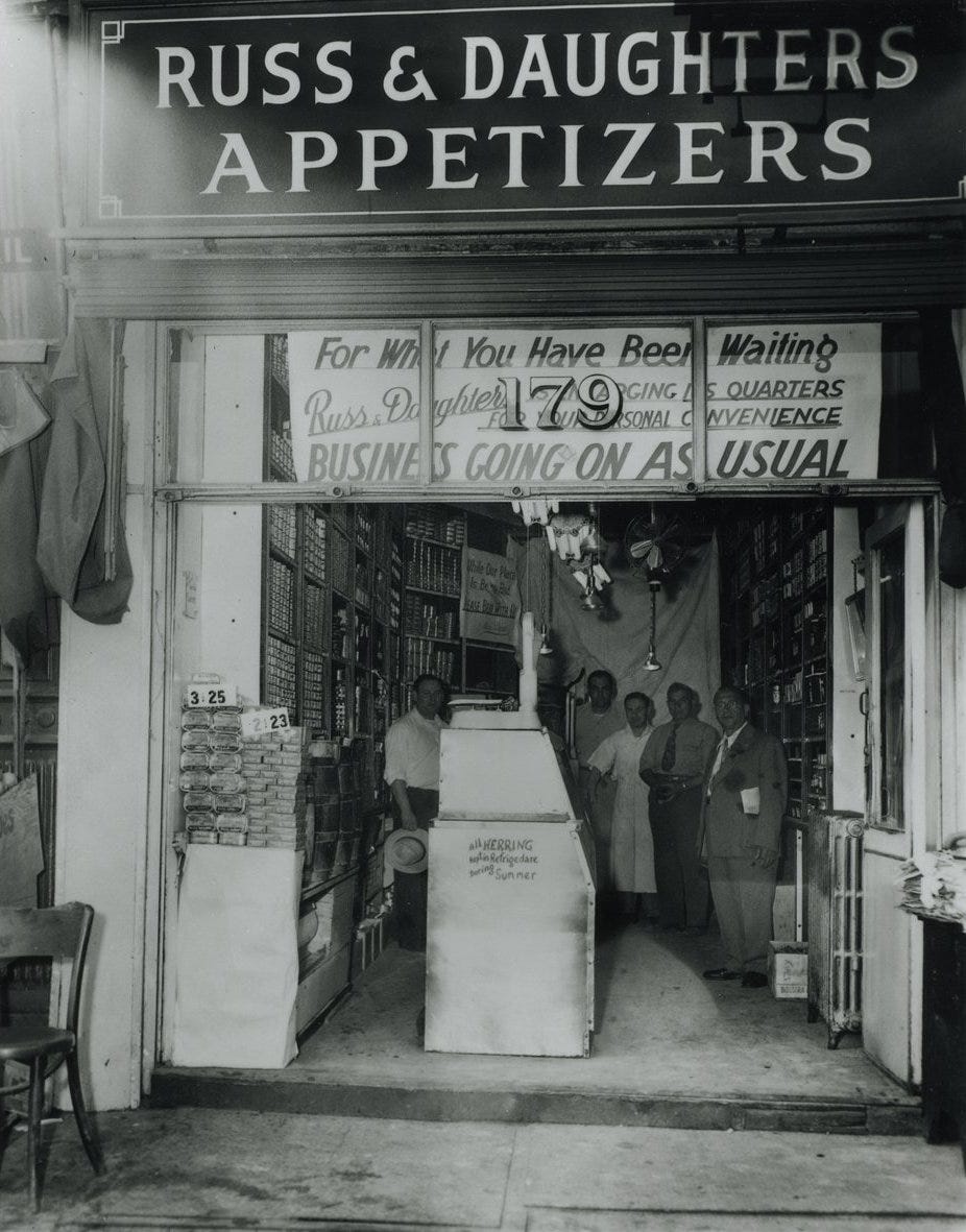 A black-and-white photo of the outside of the Russ & Daughters location at 179 East Houston Street in New York in the 1920s. A black-and-white photo of the outside of the Russ & Daughters location at 179 East Houston Street in New York in the 1920s.