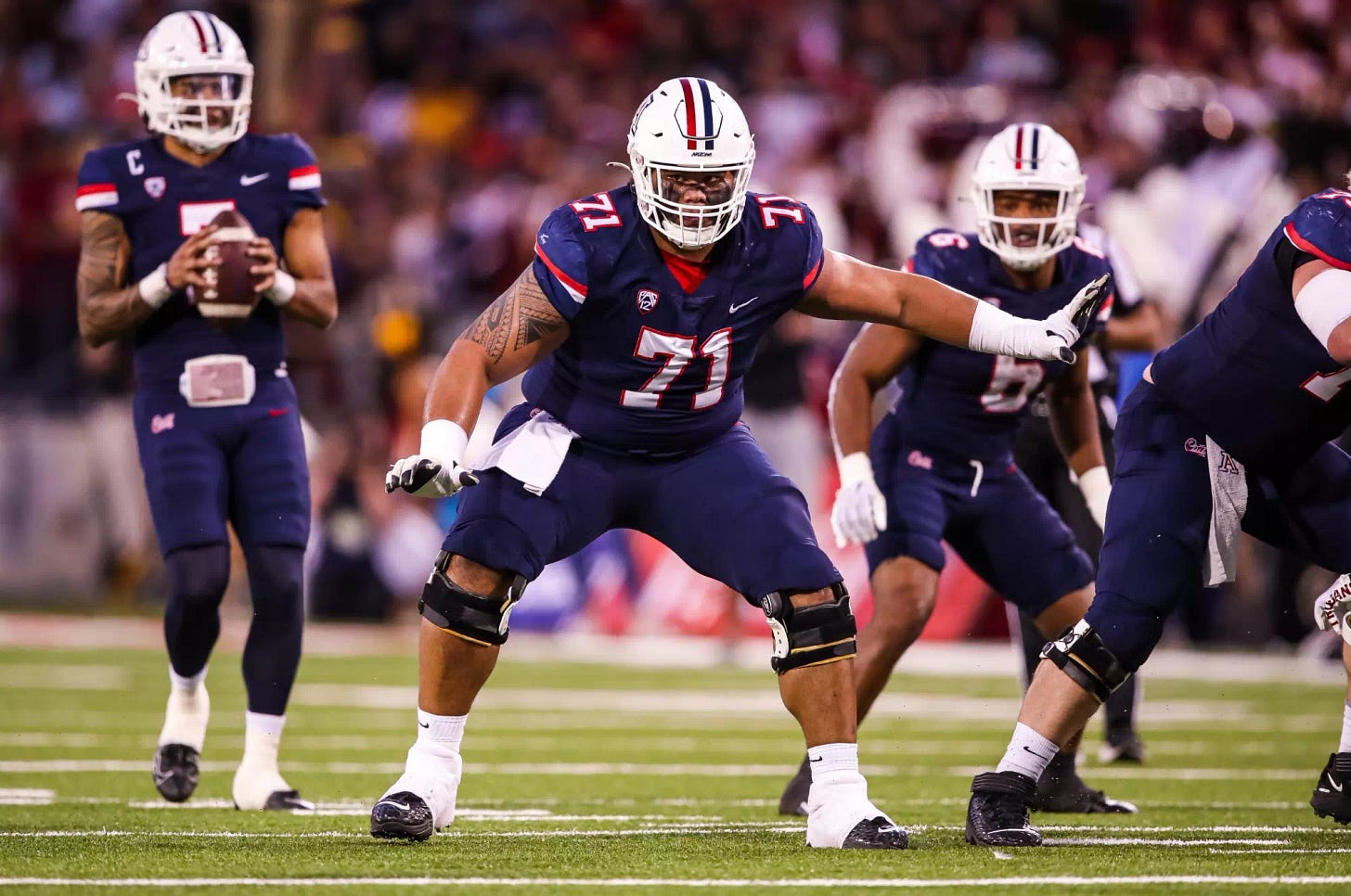 Jonah Savaiinaea Earns FWAA Freshman All-American - University of Arizona  Athletics