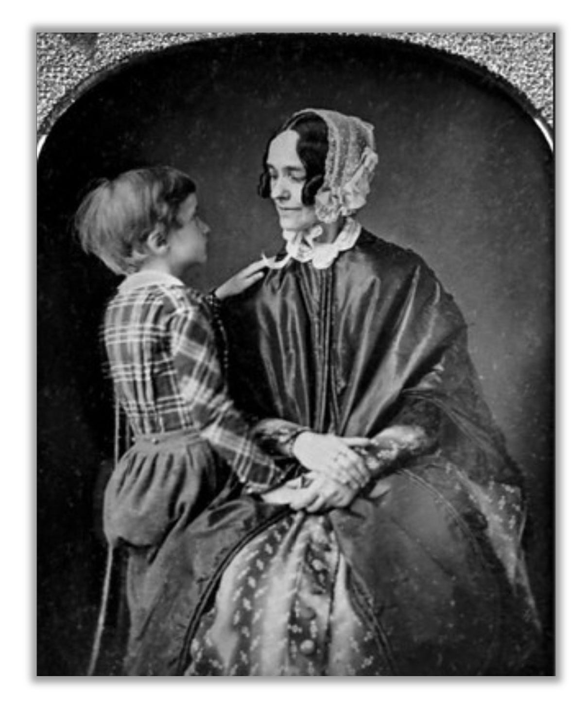 Jane Pierce with her son Benny.  The two pose for a picture, looking into each other's eyes.