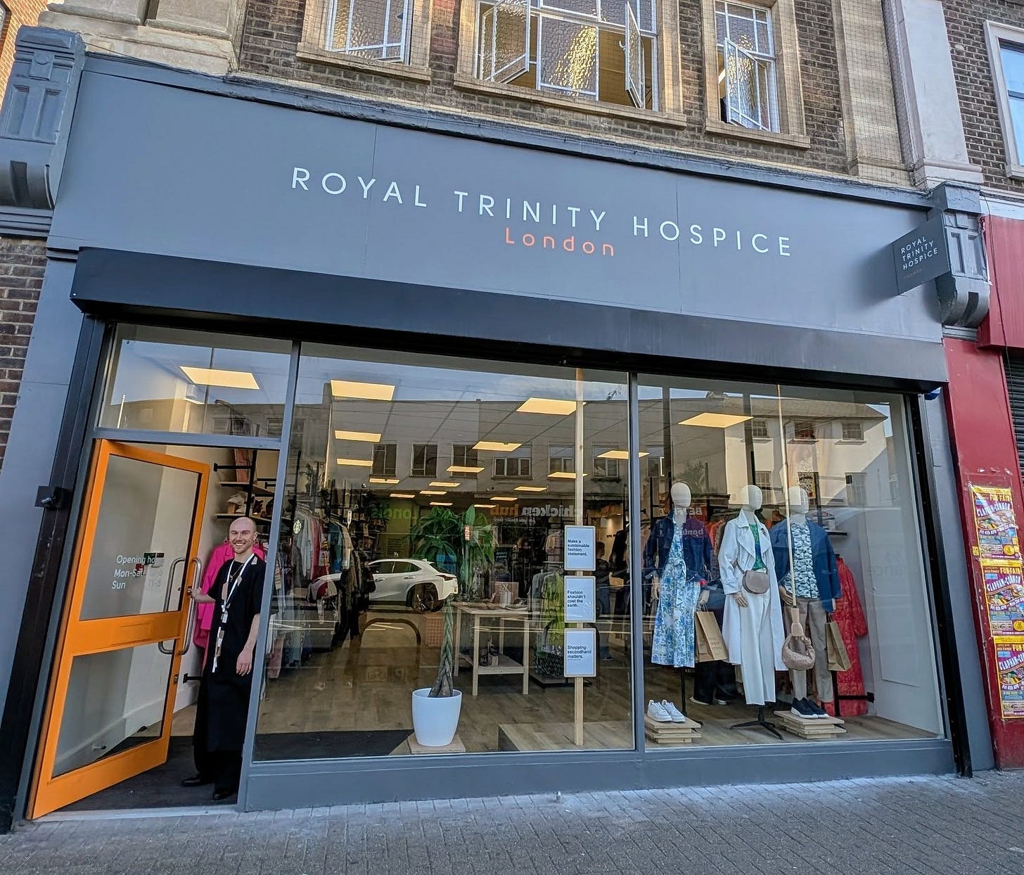 May be an image of 1 person, street and text