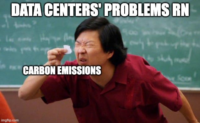 "Data centers' problems rn" above Ken Jeong as Señor Chang in a classroom, flicking away a piece of paper labelled "Carbon emissions."