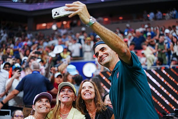 Roger Federer takes a picture with fans after an exhibition singles match during Fan Week as part of the 2026 US Open at USTA Billie Jean King... Roger Federer takes a picture with fans after an exhibition singles match during Fan Week as part of the 2026 US Open at USTA Billie Jean King...