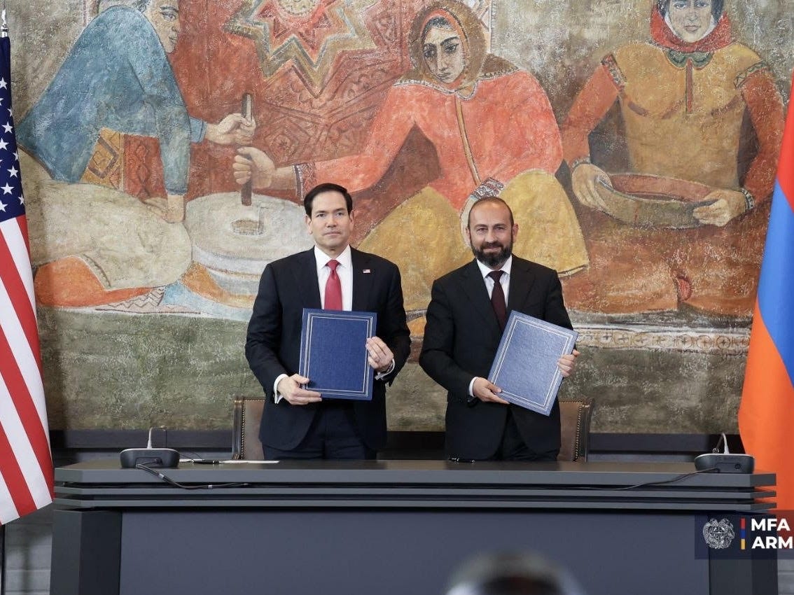 US Secretary of State Marco Rubio (left) and his Armenian counterpart, Ararat Mirzoyan, hold folders with signed copies of documents signed during Rubio’s brief visit to Yerevan on May 26. (Photo: mfa.am)