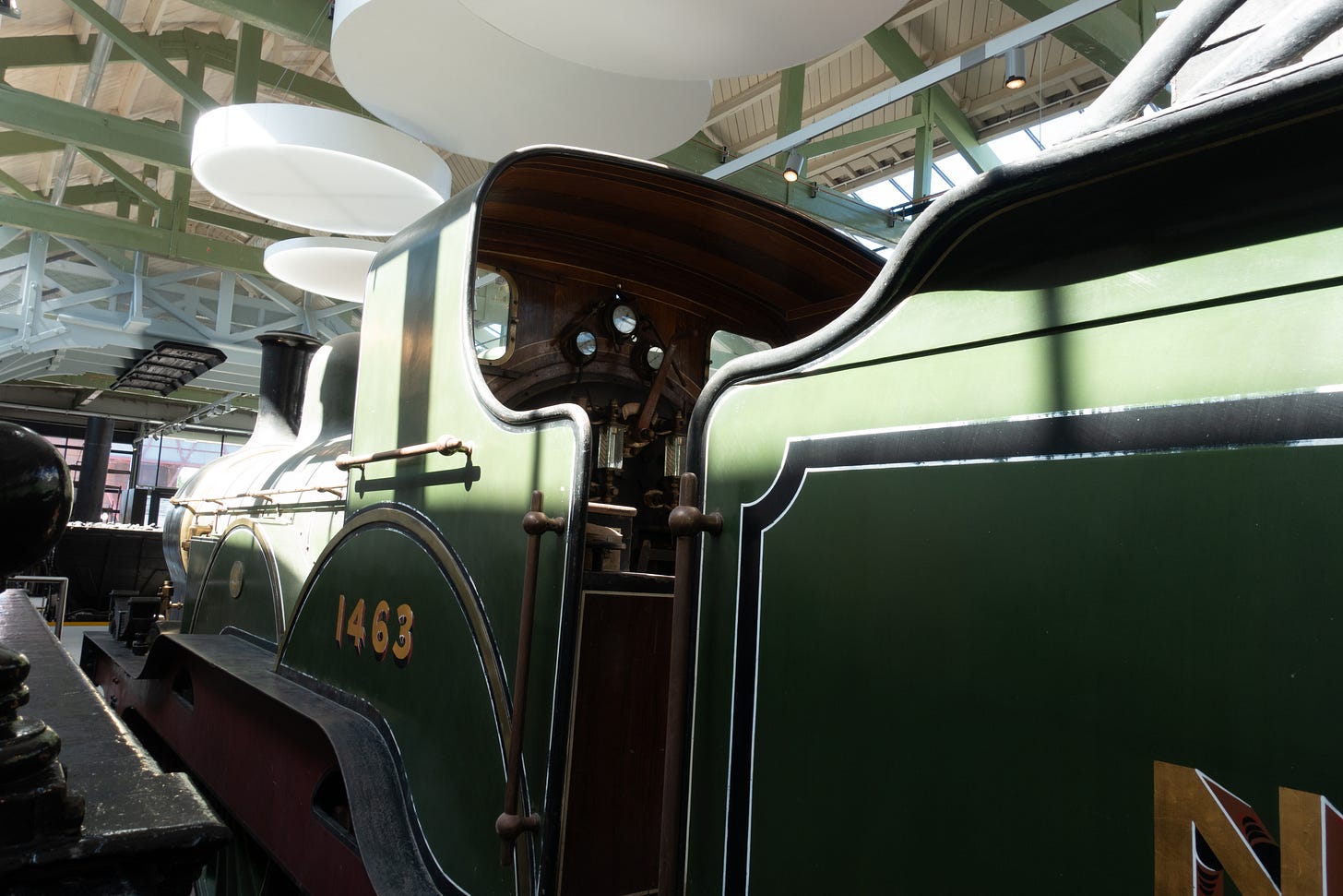 Green shiny early steam train in Hopetown museum