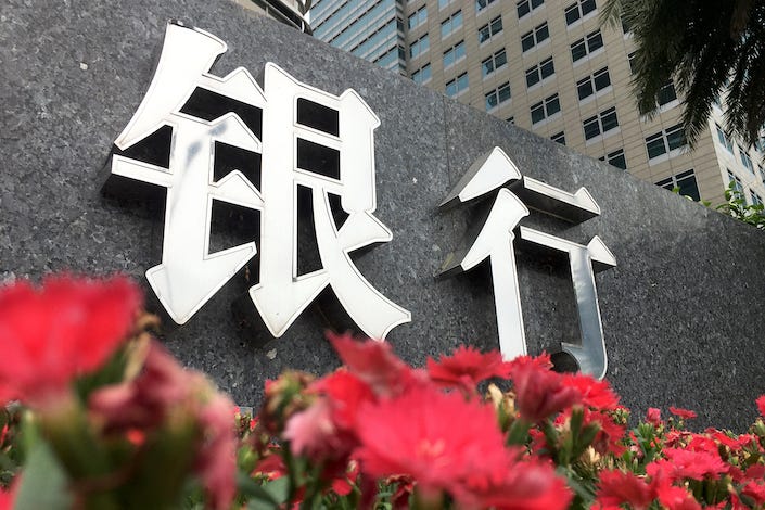 Goldman Sachs estimates that 12 large publicly traded Chinese banks hold a total of 34 trillion yuan ($4.69 trillion) of local government debt.