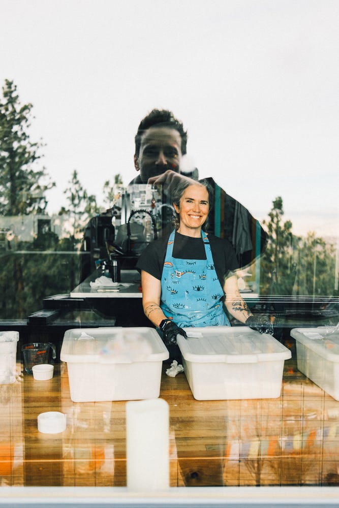 Tyler Knott Gregson and Sarah Linden Gregson in a window reflection Tyler Knott Gregson and Sarah Linden Gregson in a window reflection