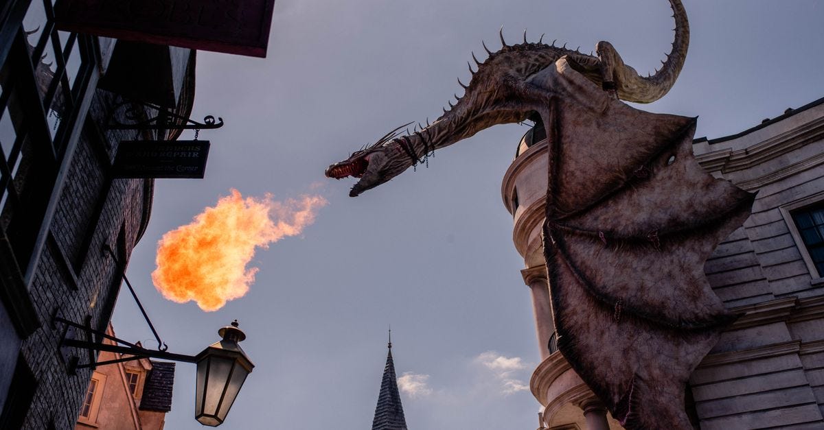 Photo: Allan Rodrigo / Pexels Stunning dragon sculpture breathing fire at a themed street in Orlando, Florida.