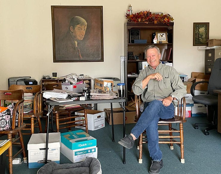 Mark Easton at the Lake Worth Herald offices on Jan. 3, 2025, a day after the weekly published for the last time, ending a 112-year run. On the wall is a portrait of Will Rogers that has decorated the Herald offices for decades. (COURTESY VINCENT CERNIGLIA) Mark Easton at the Lake Worth Herald offices on Jan. 3, 2025, a day after the weekly published for the last time, ending a 112-year run. On the wall is a portrait of Will Rogers that has decorated the Herald offices for decades. (COURTESY VINCENT CERNIGLIA)