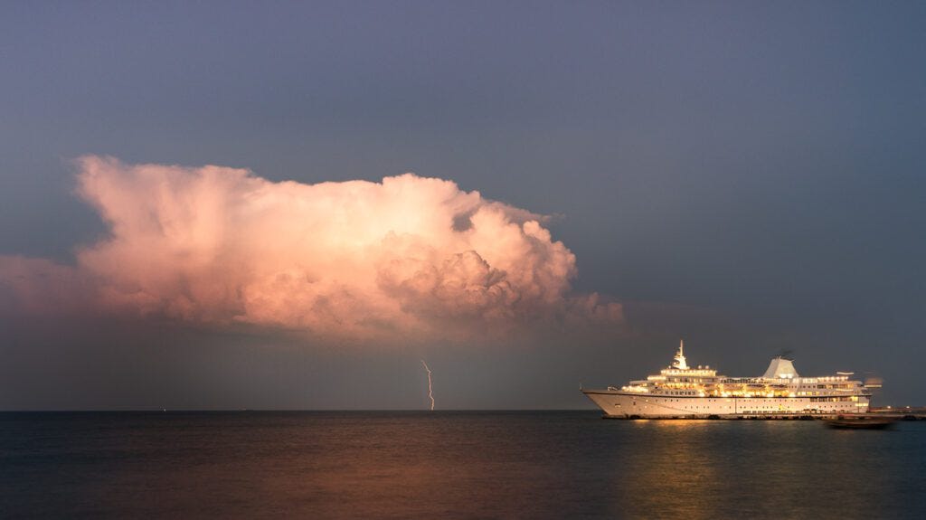 cruise ship in thunderstorm -image by fool.com cruise ship in thunderstorm -image by fool.com