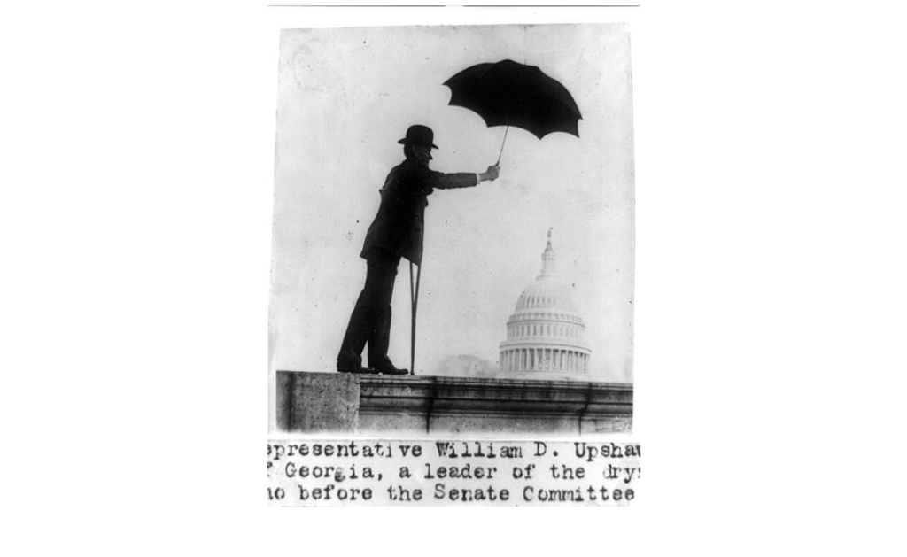 A person holding an umbrella

AI-generated content may be incorrect.