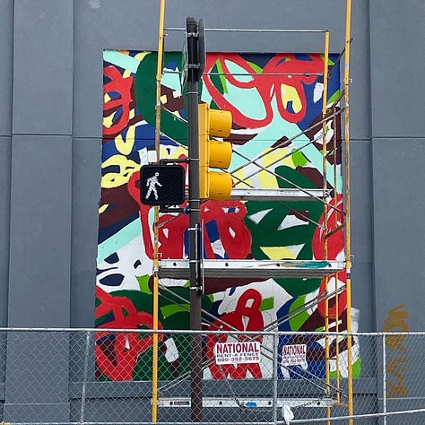 Series of nine photos depicting the evolution of my mural "Bound Together" located at 10th and Callowhill Streets in Philadelphia's Chinatown area.