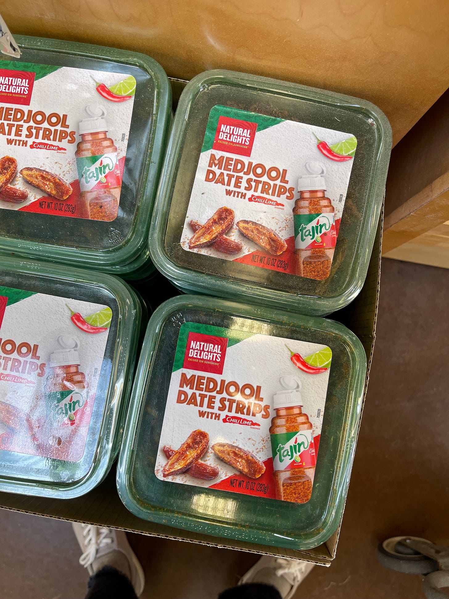 Medjool Date Strips with Tajin piled in a supermarket