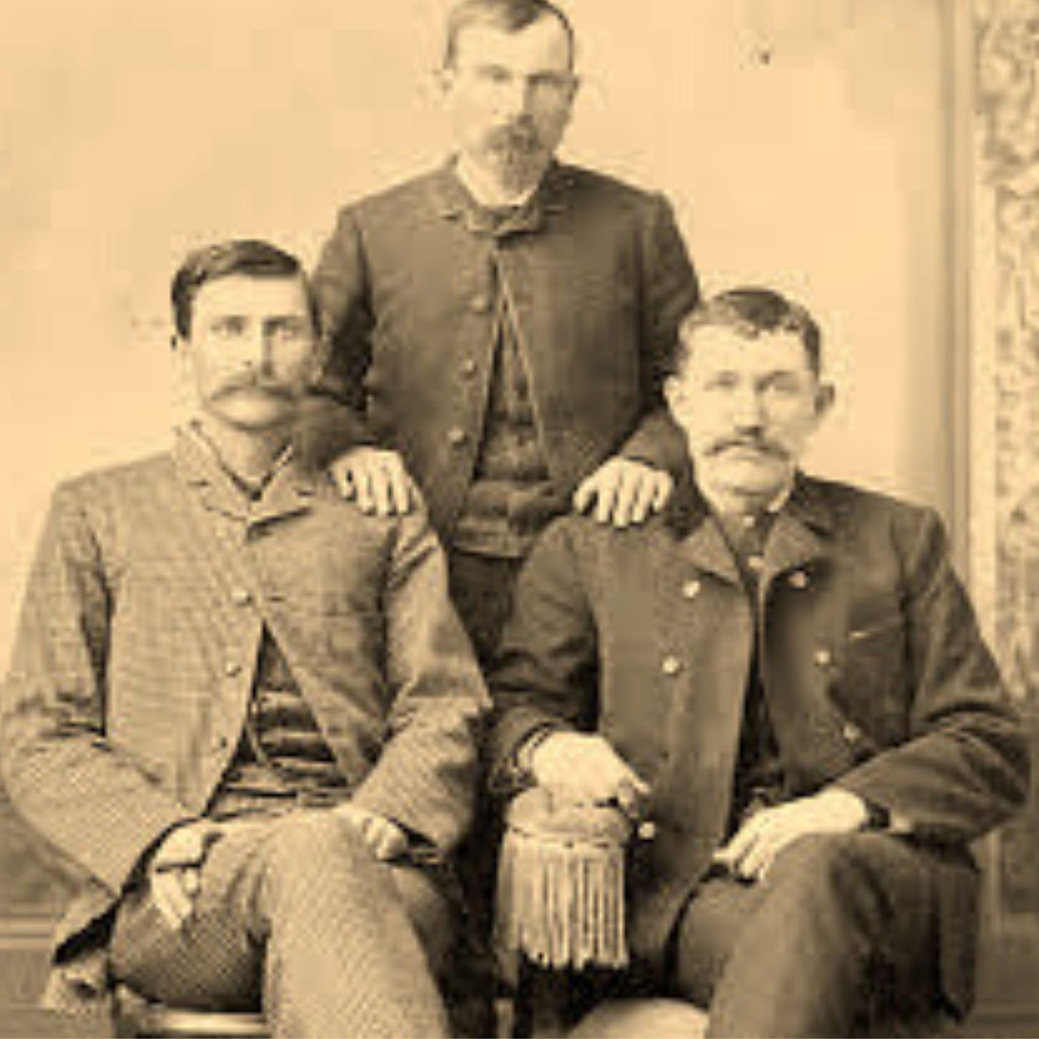 Photo of Pat Garrett and John W. Poe seated, with another lawman James Brent standing Photo of Pat Garrett and John W. Poe seated, with another lawman James Brent standing