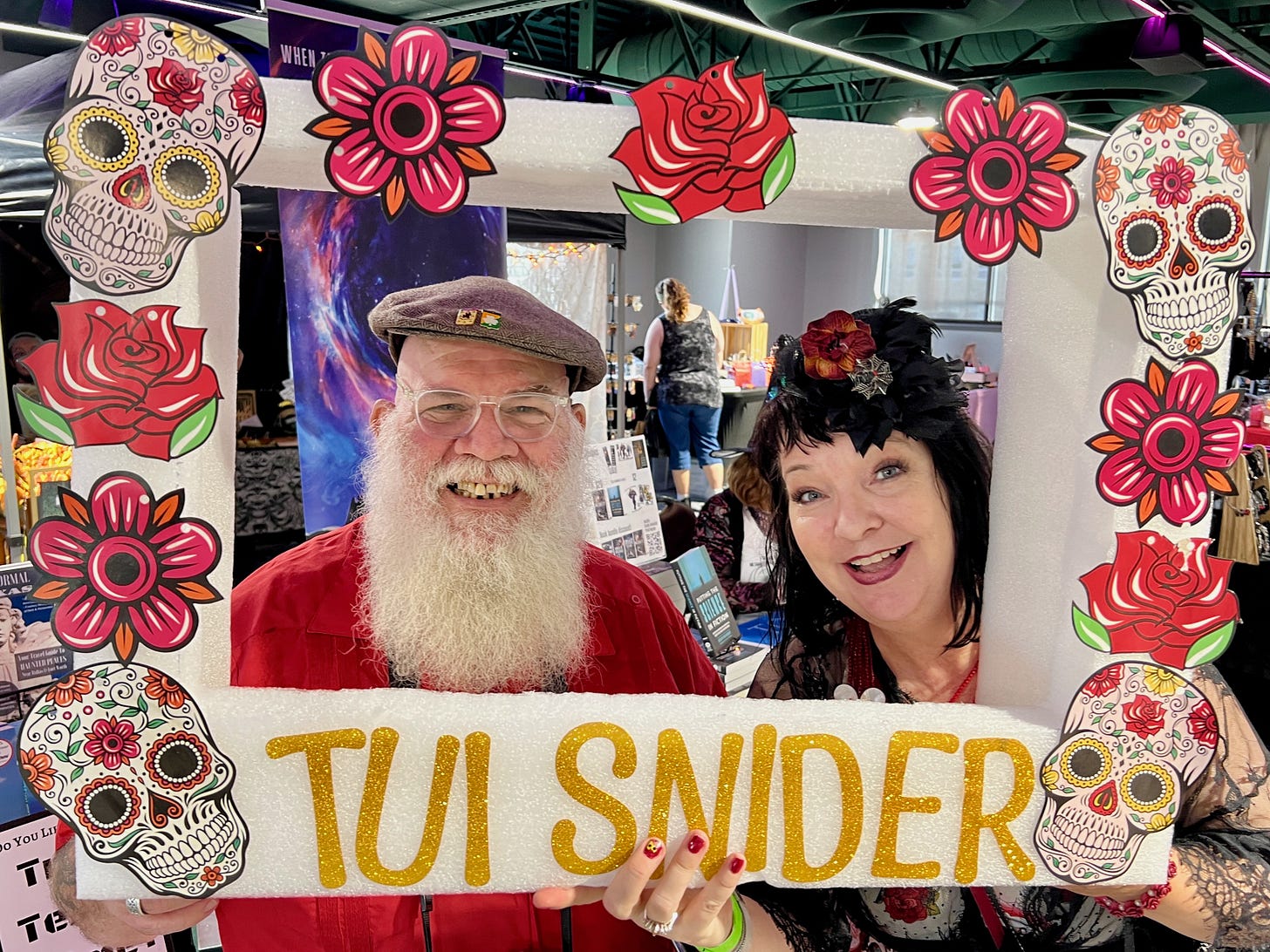 My selfie frame was a big hit at Granbury’s Spooky Spectacle. (Even Santa bought a book! Just kidding: his name is Orion.)