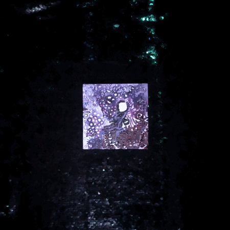 Rainbow Squared, Year 5, Piece Twelve: 48. Black White Purple. An animated loop of a small square painting hopping in a spiral on top of a black sequin background, then snapping in reverse order under a blacklight.