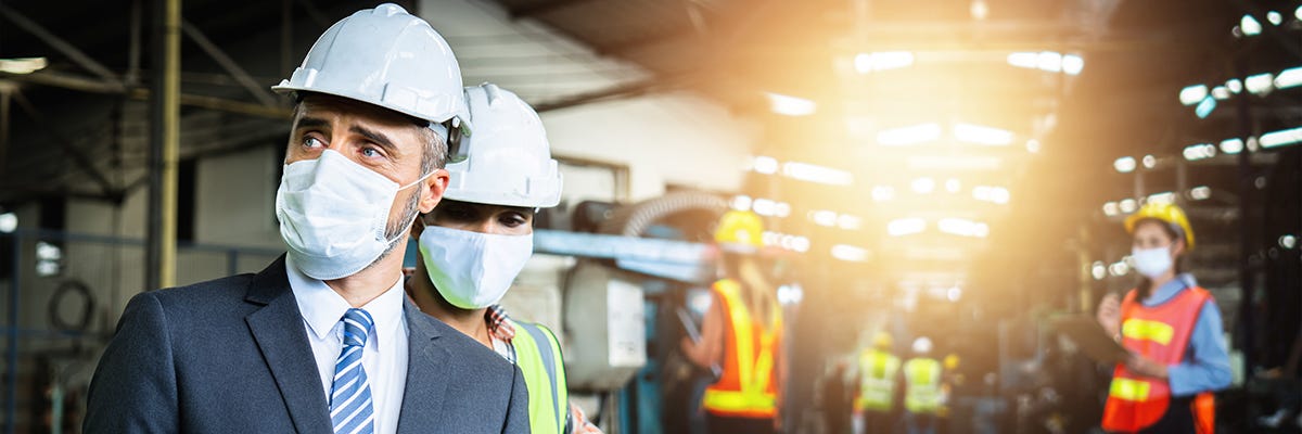 A group of people wearing hard hats

Description automatically generated with low confidence