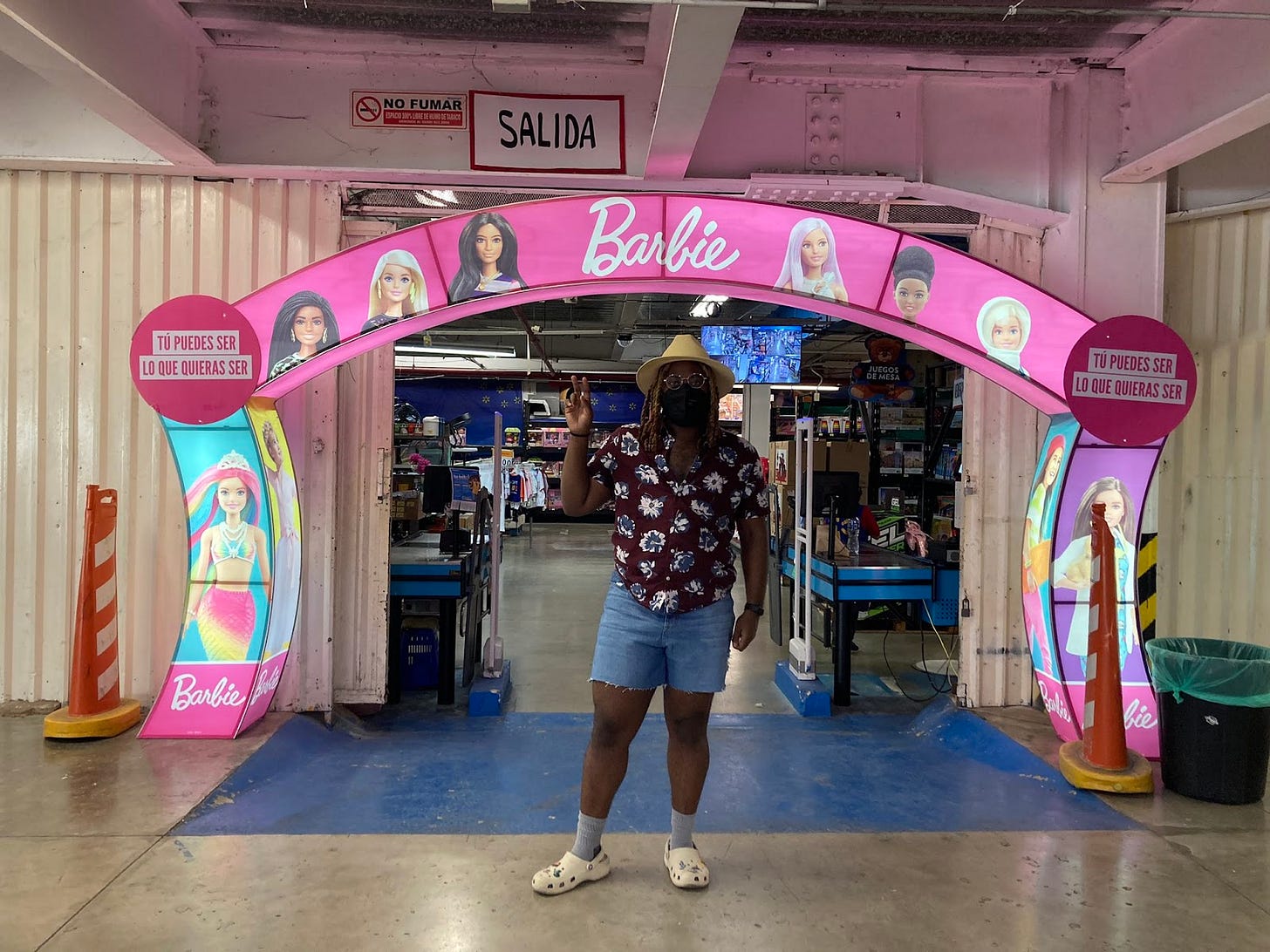 KB posing in front of a Barbia dugout that seems to be in a warehouse.