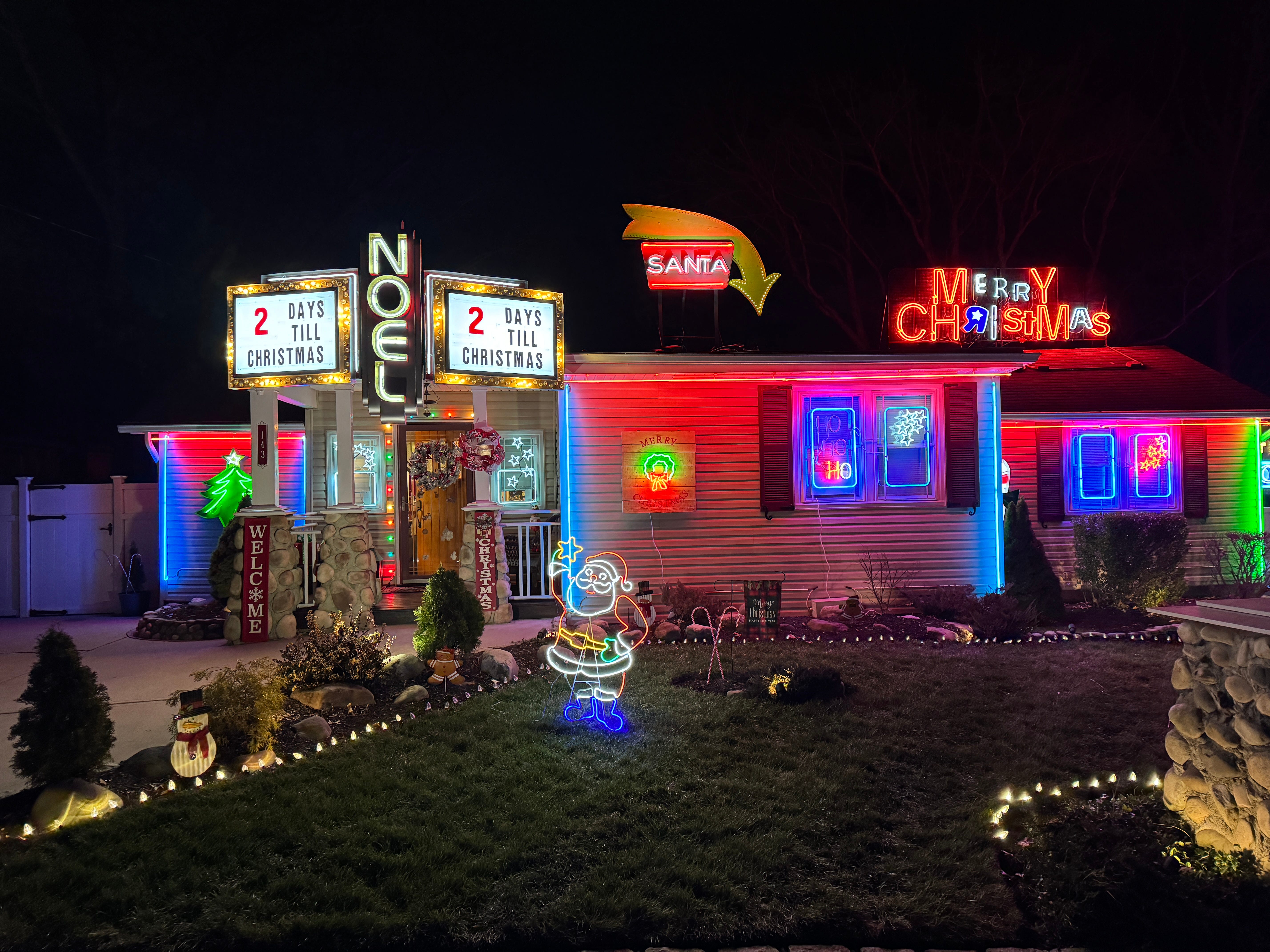 SEE IT: The Neon Christmas House is a bright, shining slice of