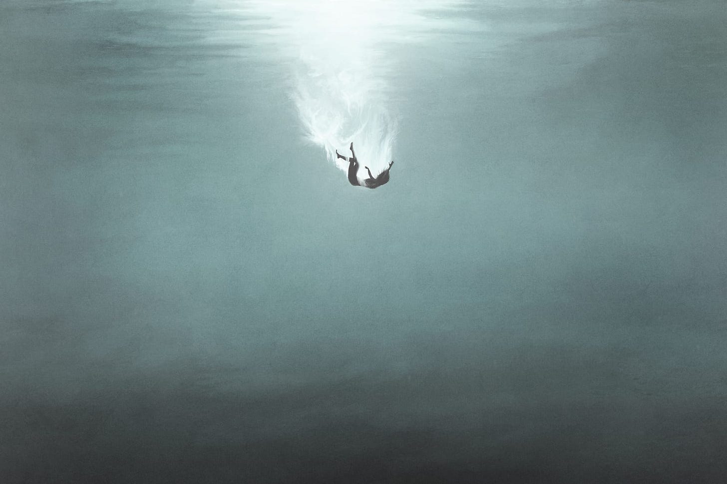 Woman falling through water.