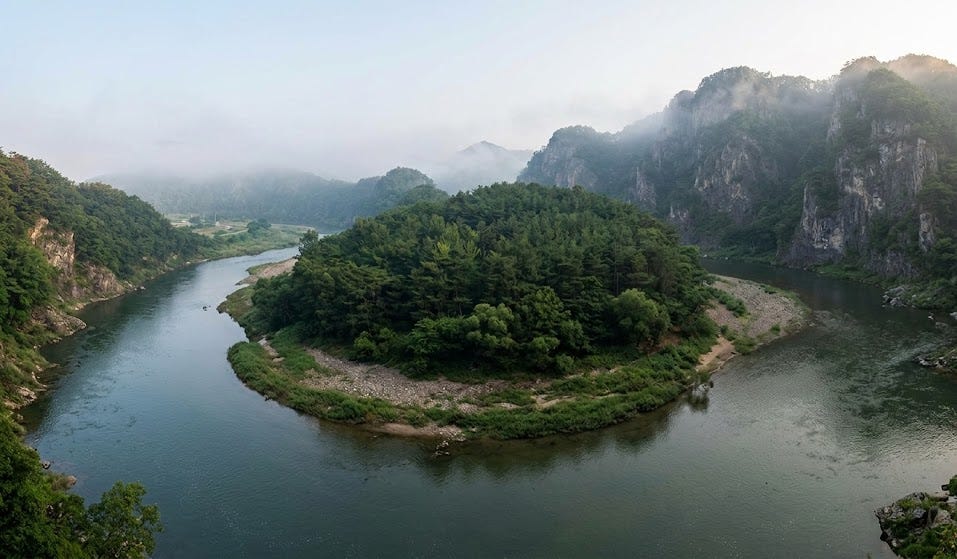 Cheongnyeongpo in Yeongwol, the actual site of King Danjong's solitary exile featured in the movie 'The Man Who Lives with the King'. It is surrounded by a river on three sides and a cliff at the back, capturing a chilly yet beautiful atmosphere. Cheongnyeongpo in Yeongwol, the actual site of King Danjong's solitary exile featured in the movie 'The Man Who Lives with the King'. It is surrounded by a river on three sides and a cliff at the back, capturing a chilly yet beautiful atmosphere.
