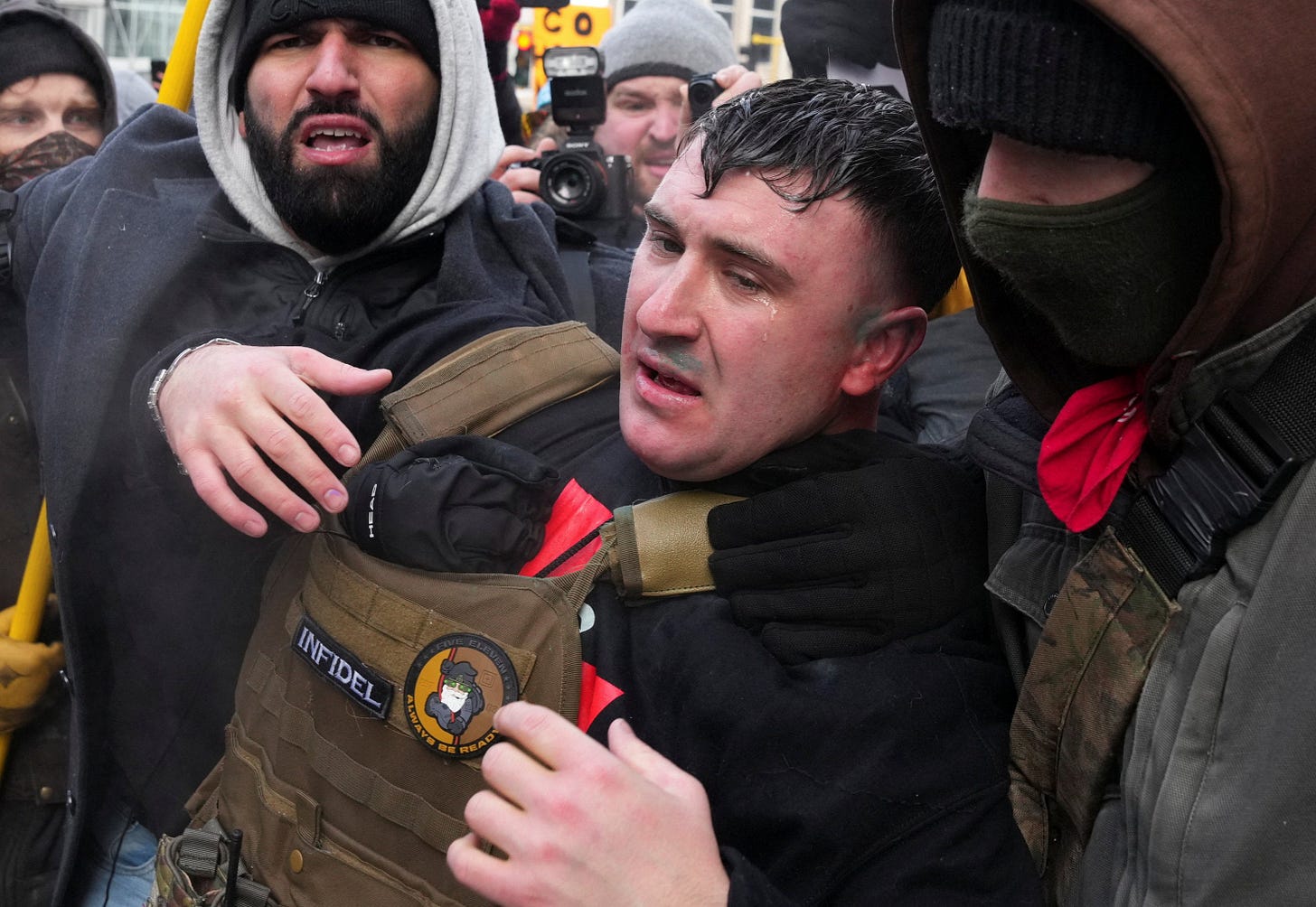 Pardoned Jan 6 rioter chased from pro-ICE rally in Minneapolis after  blasting 'Ice, Ice Baby' and threats to burn Quran | The Independent