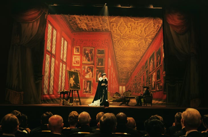 A still from Maria, showing a woman on stage A still from Maria, showing a woman on stage