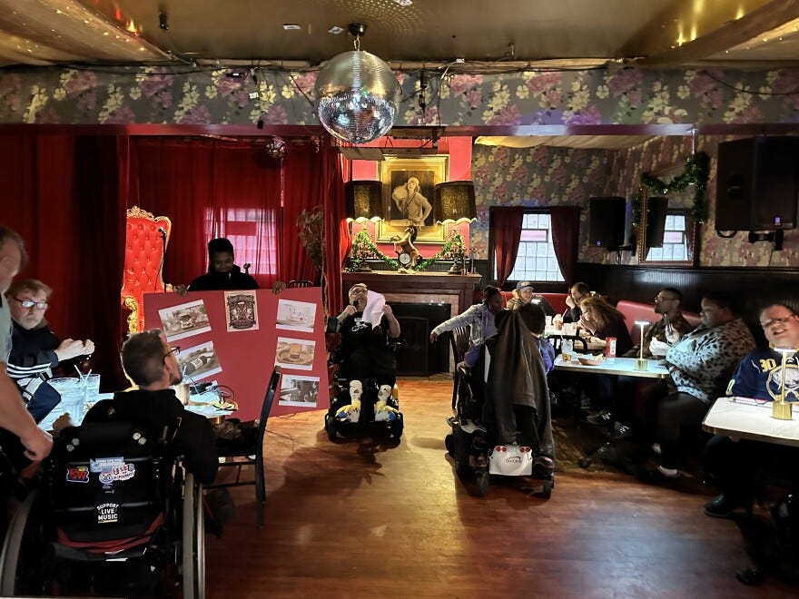 Headlining comedian Mike Rogers performs in front of a crowd at Funny Bones comedy night at the Gypsy Parlor in March 2026.