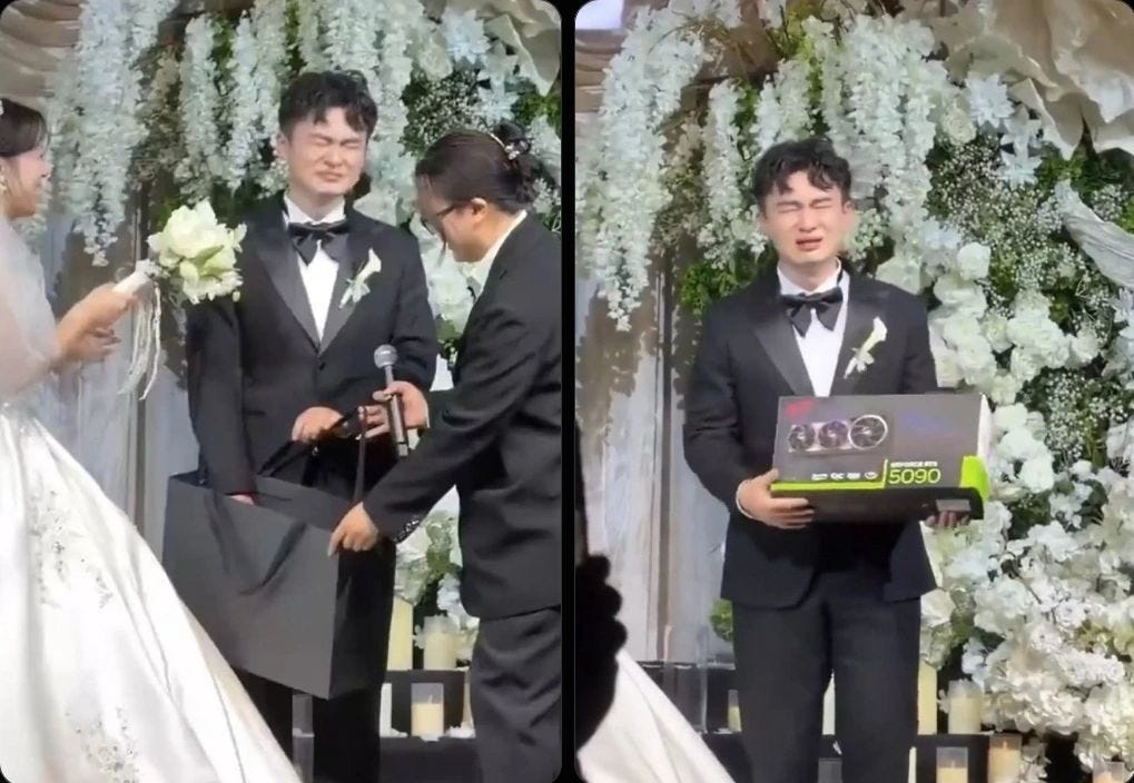 Groom holding a boxed Nvidia RTX 5090 graphics card at a wedding with the bride beside him Groom holding a boxed Nvidia RTX 5090 graphics card at a wedding with the bride beside him
