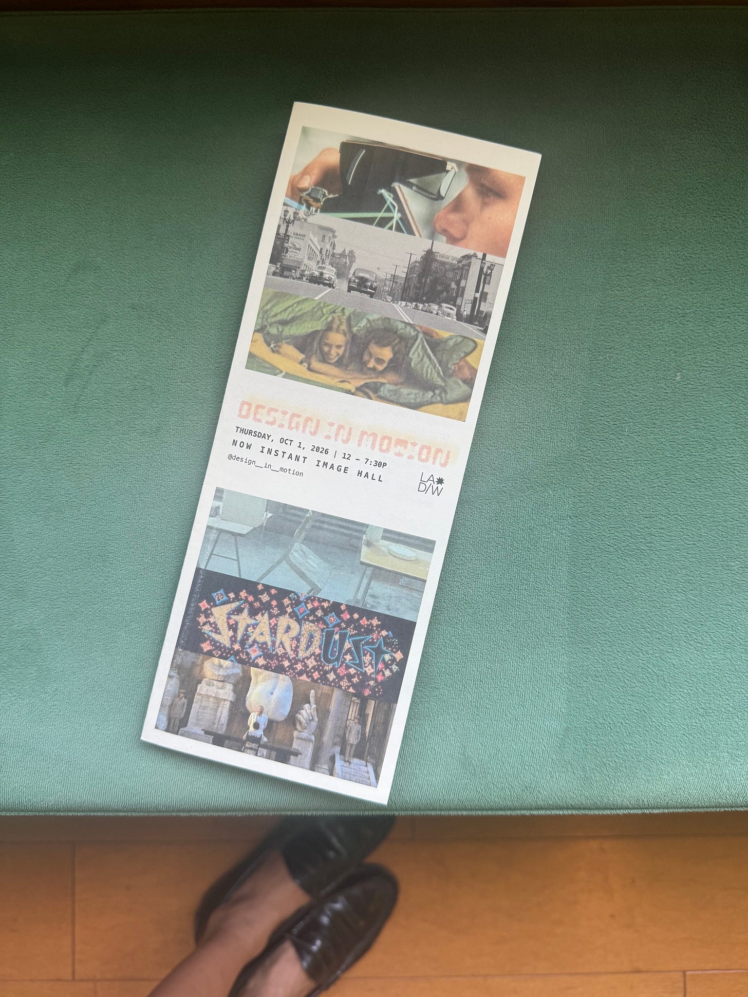Program from the Design in Motion curated shorts shown on a green velvet banquette and the author's shoes.