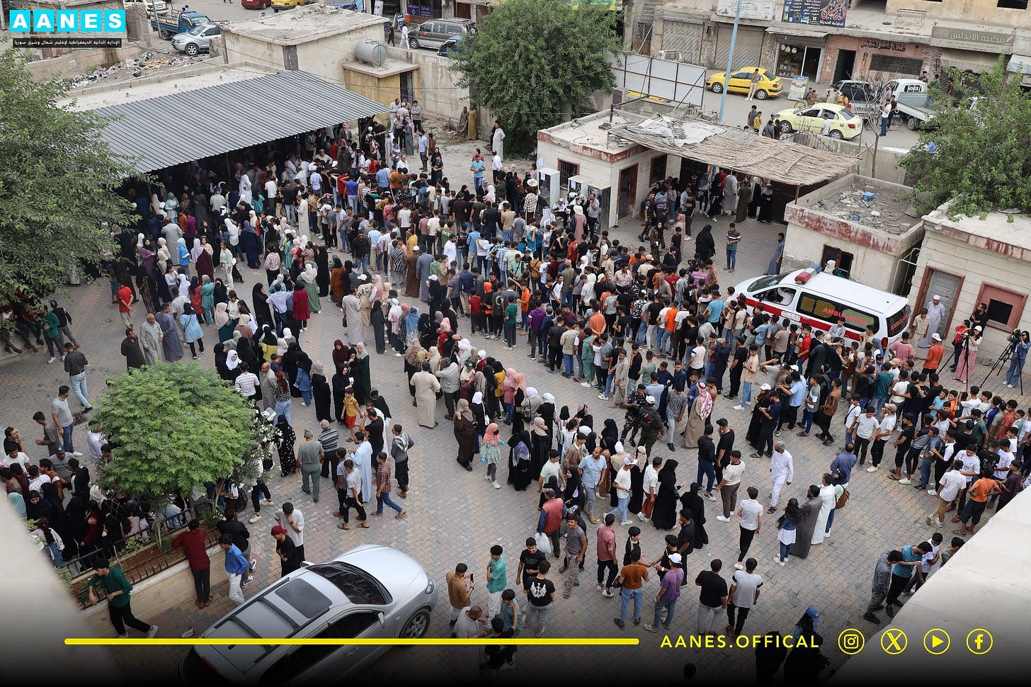 May be an image of one or more people, crowd and text