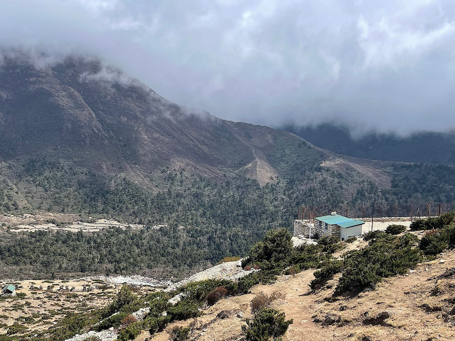 I visited the toilets in a hillside schoolyard, which involved climbing through a fence and down a stone wall and back up again.