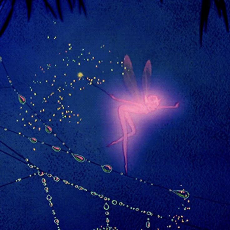 This may contain: the tinkerbell fairy is flying through the air