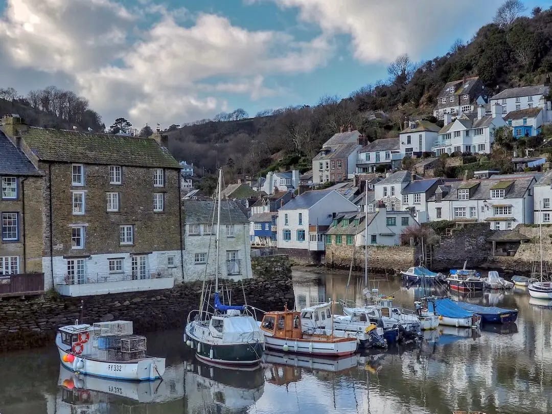 Cottages on a hillside overlooking a harbour