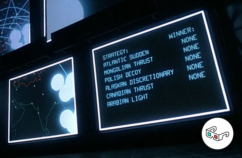 Un mur d'écrans d'ordinateurs simulant différentes stratégies d'attaque militaires dans le film Wargames de John Badham (1983)