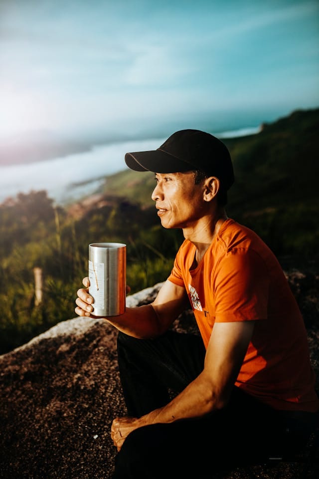 Man Enjoying Scenic View in Kon Tum, Vietnam