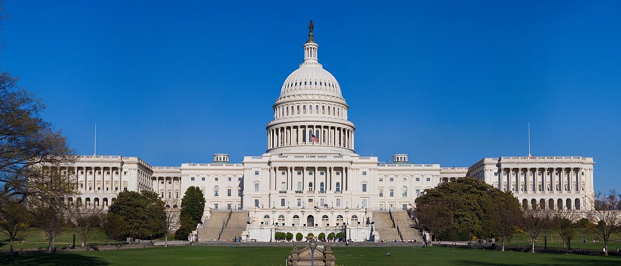 https://upload.wikimedia.org/wikipedia/commons/thumb/2/27/Capitol_Building_Full_View.jpg/1280px-Capitol_Building_Full_View.jpg