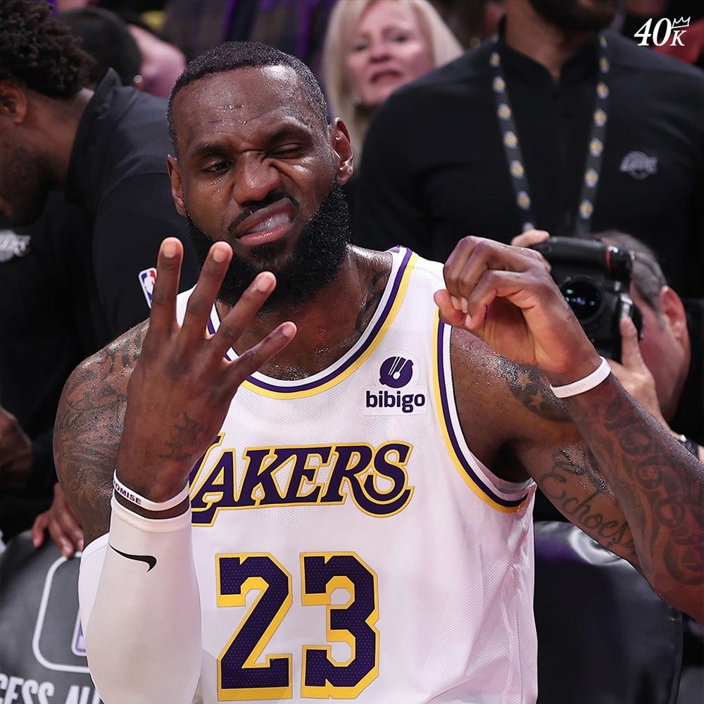 Slideshow-image: The moments from LeBron reaching 40,000 points and celebrating his achievement....
