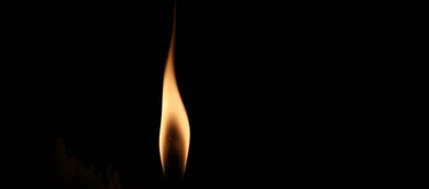 Small Flame On Dark Black Background Stock Photo 399133204 | Shutterstock