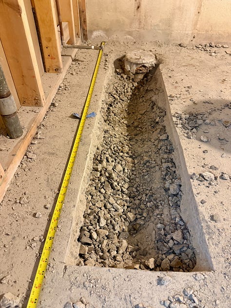 Photo mosaic of concrete being broken up with a jackhammer.